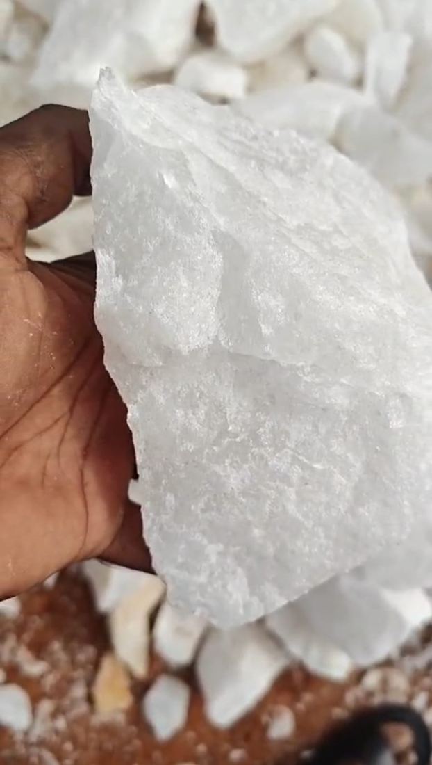 Close-up of a white quartz lump at the stockyard